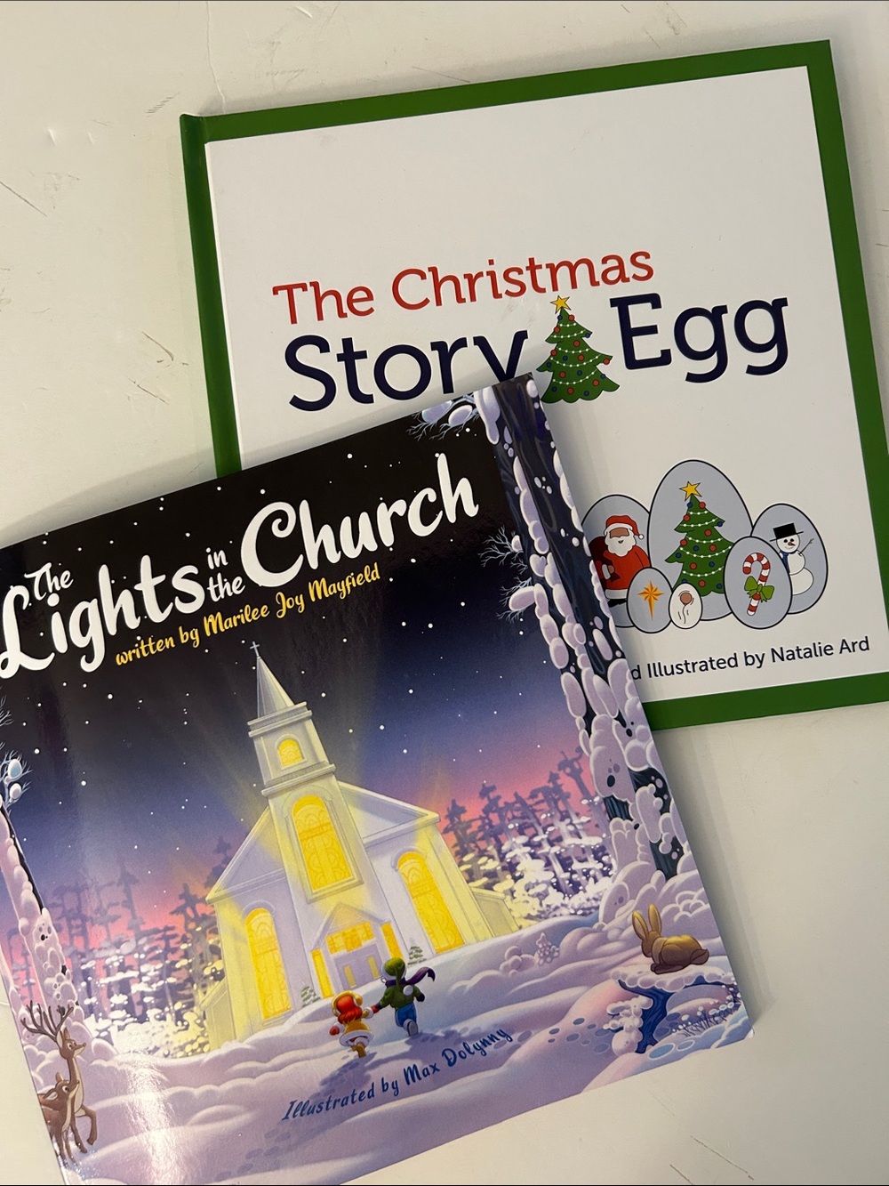 Christmas Story Egg hardcover book & The Lights in the Church Holiday Book BOTH